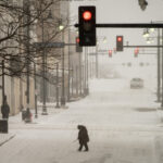 Snowstorm Hits Midwest as Region Braces for Ice and Freezing Rain